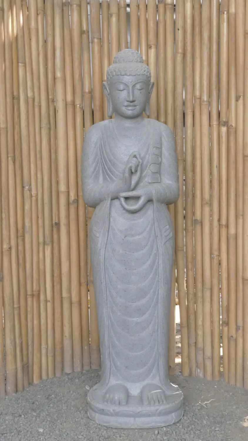  Product image 1 of the product “Standing Buddha made of Riverstone in Dharmachakra position - gesture of wheel of the teaching of Dharma. About 153cm height. ”